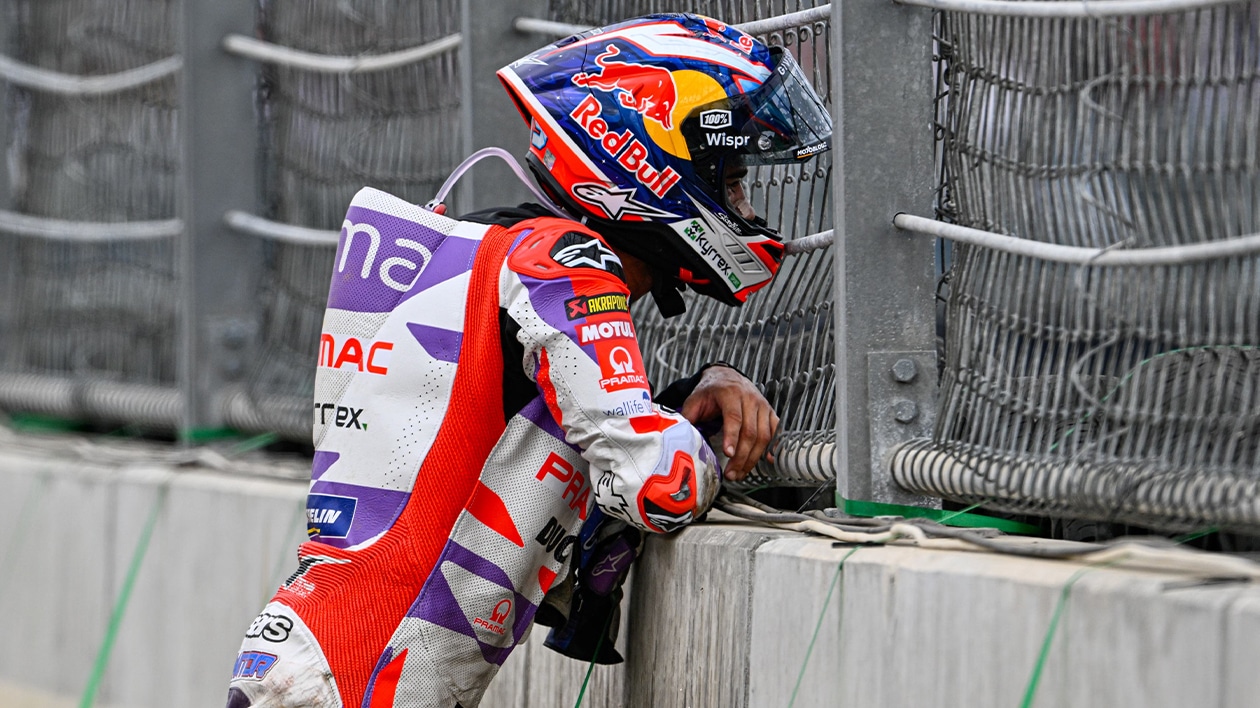 Jorge-Martin-leans-on-barrier-after-crashing-out-at-2023-MotoGP-Indonesian-GP.jpg